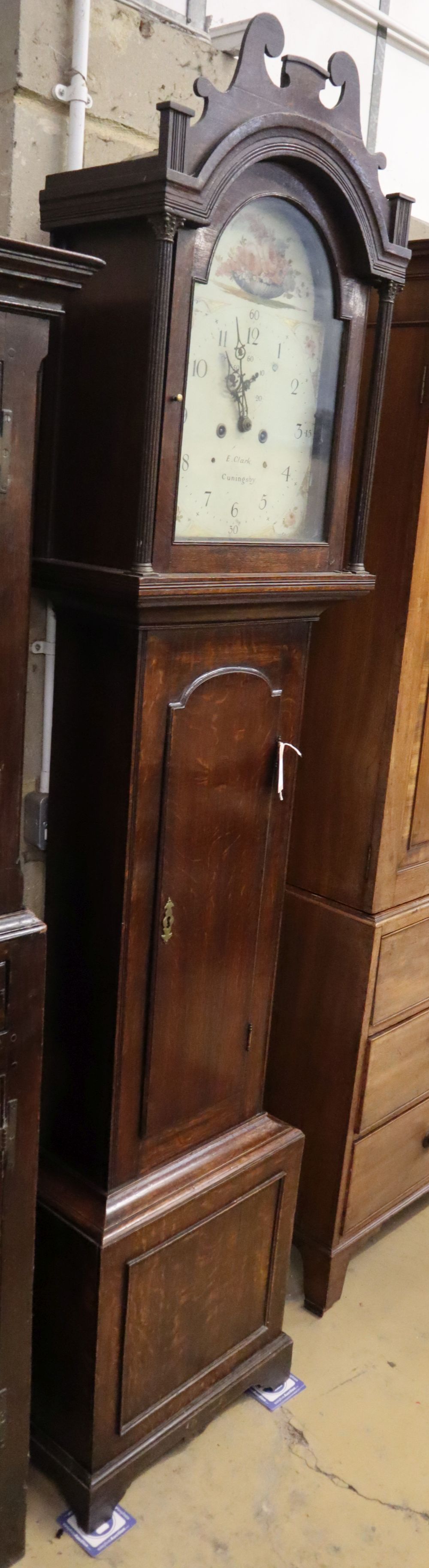 A George III oak eight-day longcase clock, by E. Clark, Cuningsby [sic], W.48cm, D.24cm, H.216cm